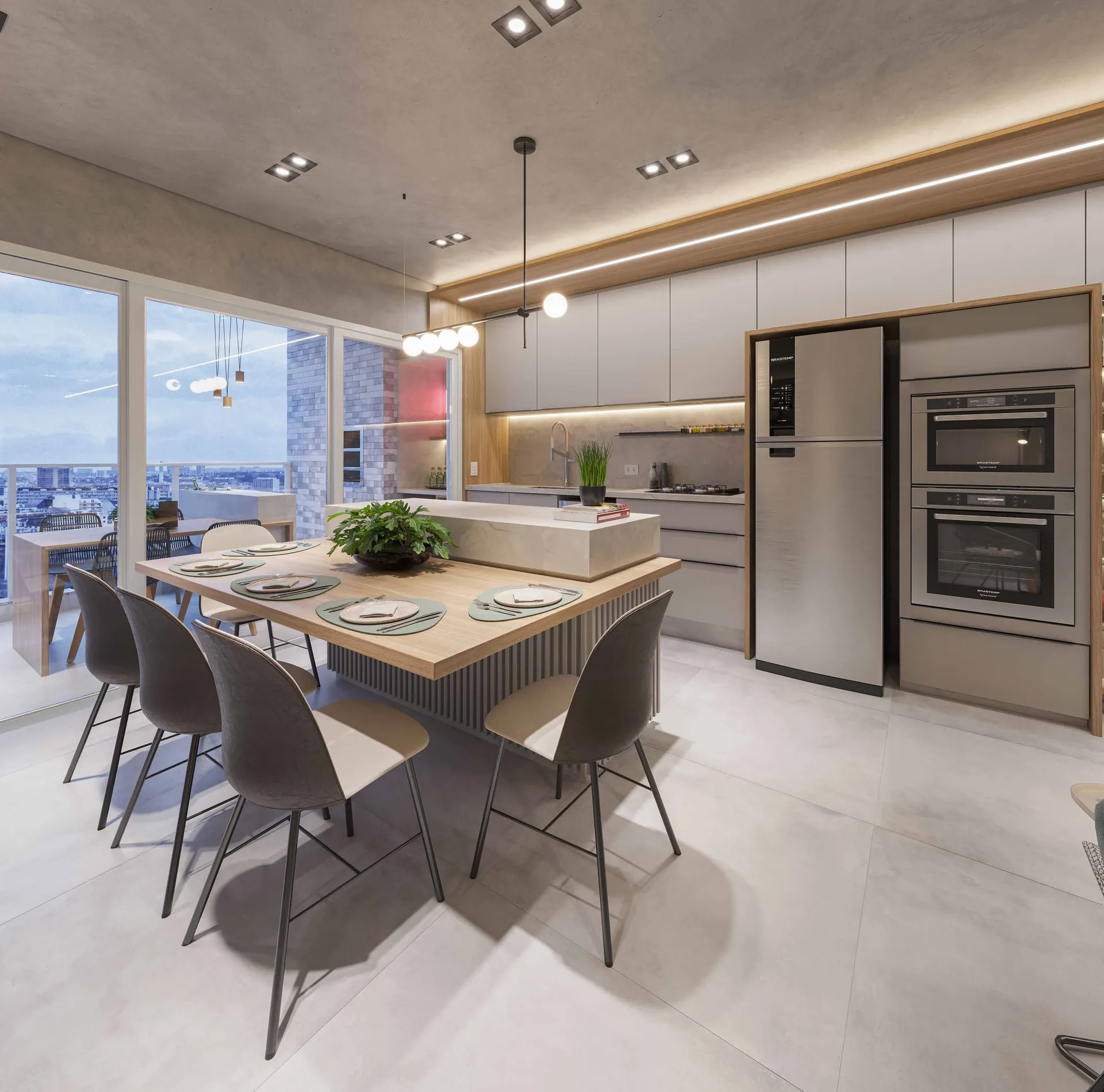 Cozinha com ilha e mesa de jantar no apartamento do Alto de Moz em Maringá