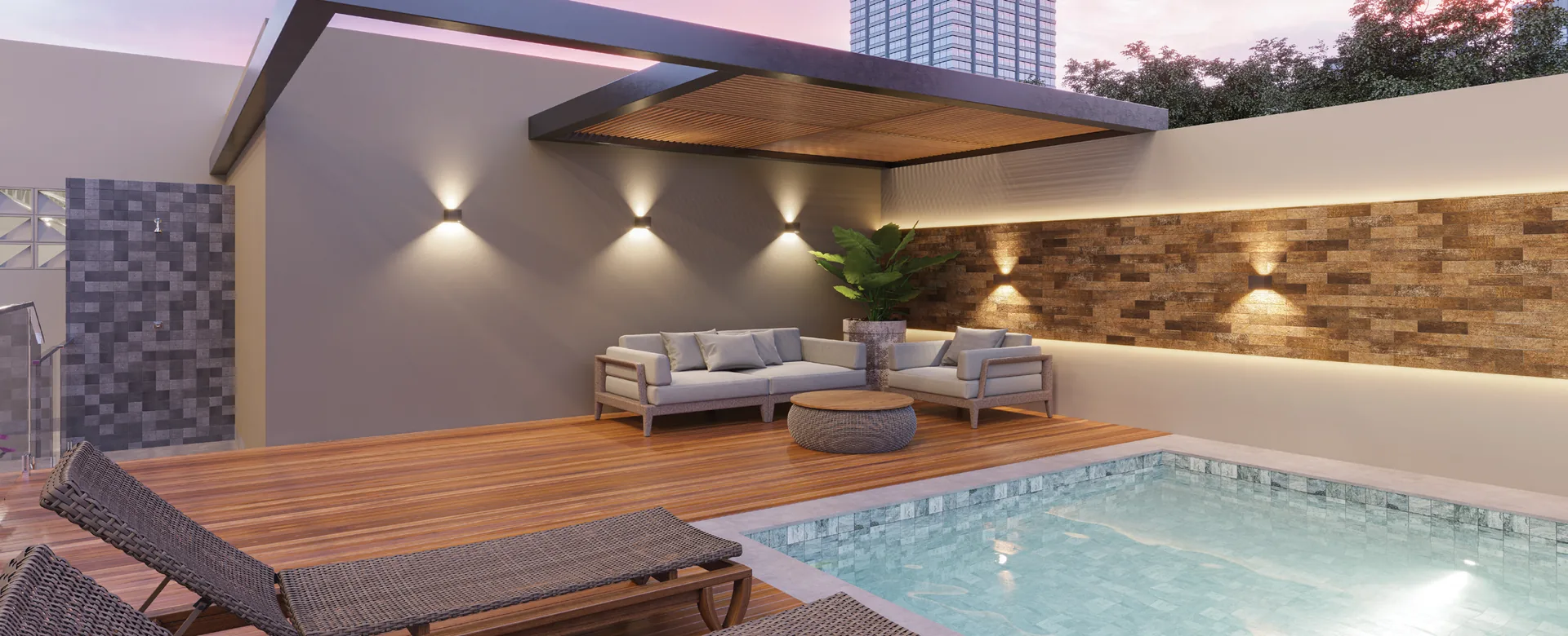 Lounge com sofás junto à piscina do Alto Paraíso Residencial