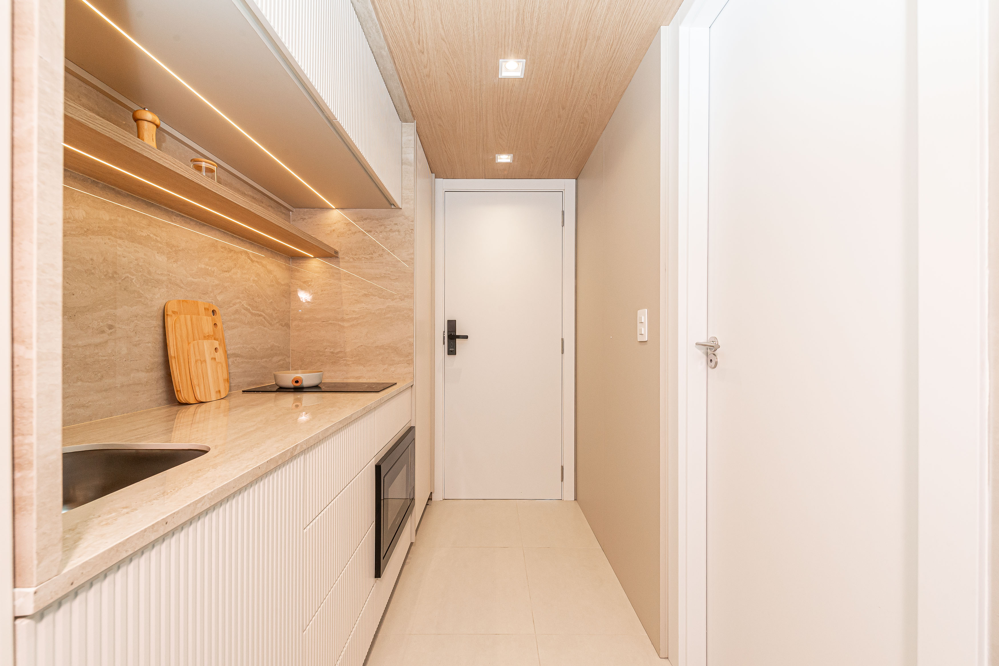 Studio AYA — cozinha americana e living integrados