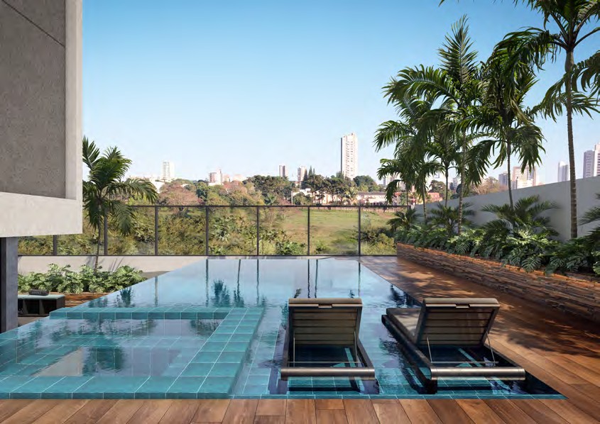 Piscina com borda infinita e deck molhado do Célis Park com vista para Maringá