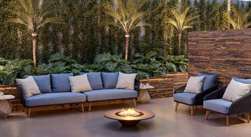 Terraço de convivência do Célis Park com firepit e áreas verdes