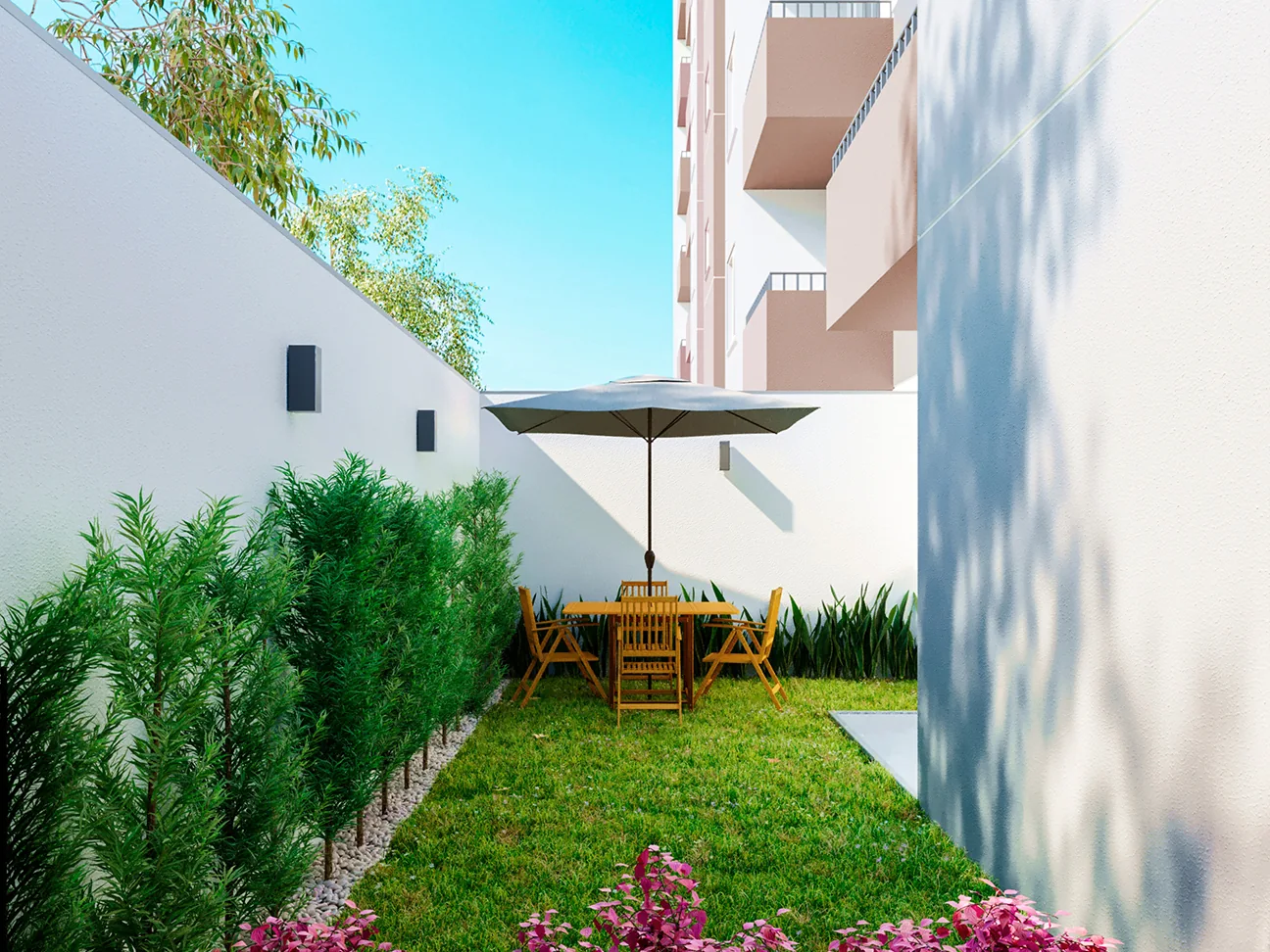 Jardim privativo com mesa e ombrelone em unidade Garden do Cittrino