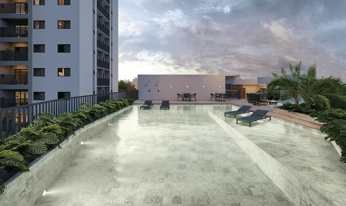 Piscina com espreguiçadeiras no rooftop do edifício garagem do Lumme em Maringá