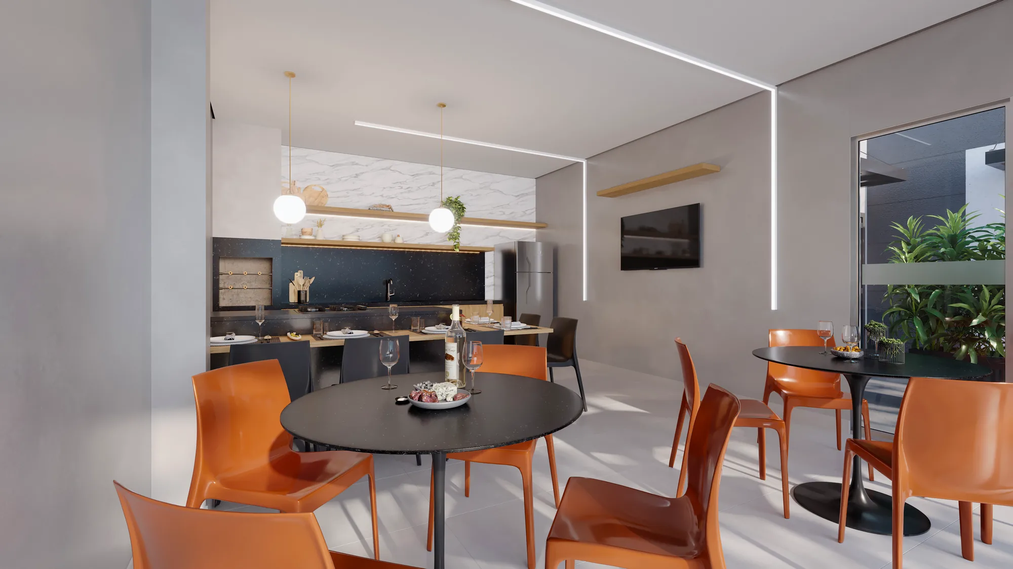 Espaço gourmet do Sensia Jardim com cozinha e mesas em Maringá